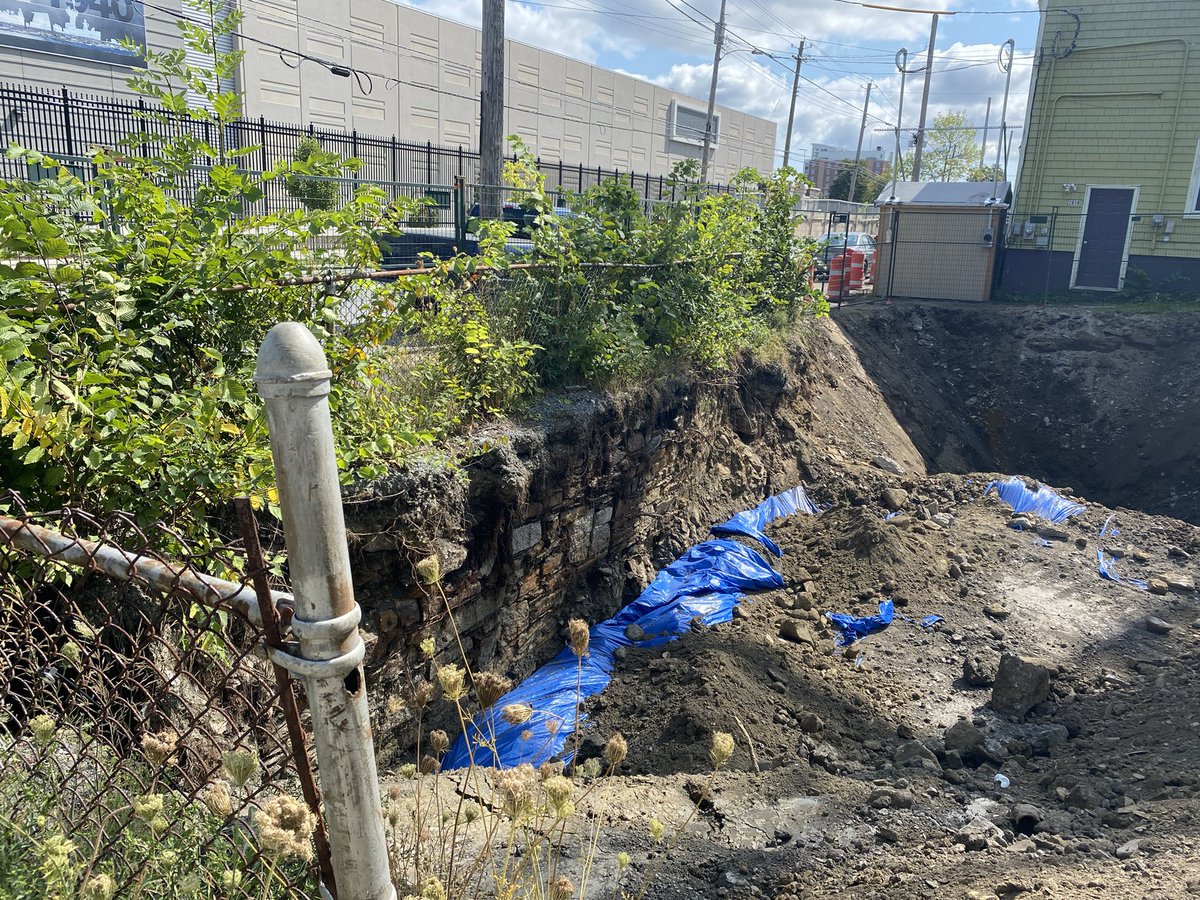 Went for a walk. Saw a bunch of hard hats staring into a hole. 2 possibilities - 1. Un marked utilities or 2.Buried  old stuff: