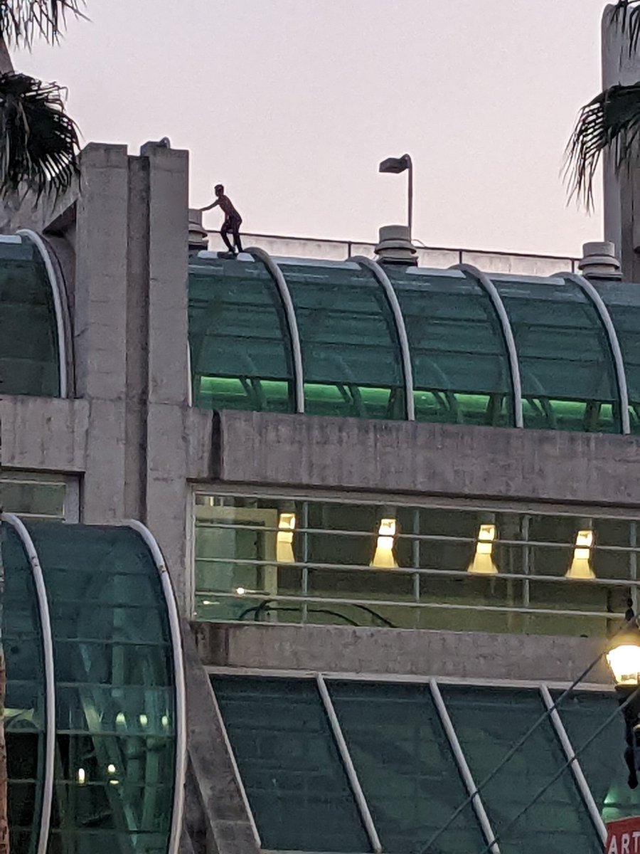 PBPlanning's tweet photo. Anyone know how long the police will wait for the guy on the SD convention center? How much taxpayer money is being wasted. https://t.co/SbgaaoSOHI