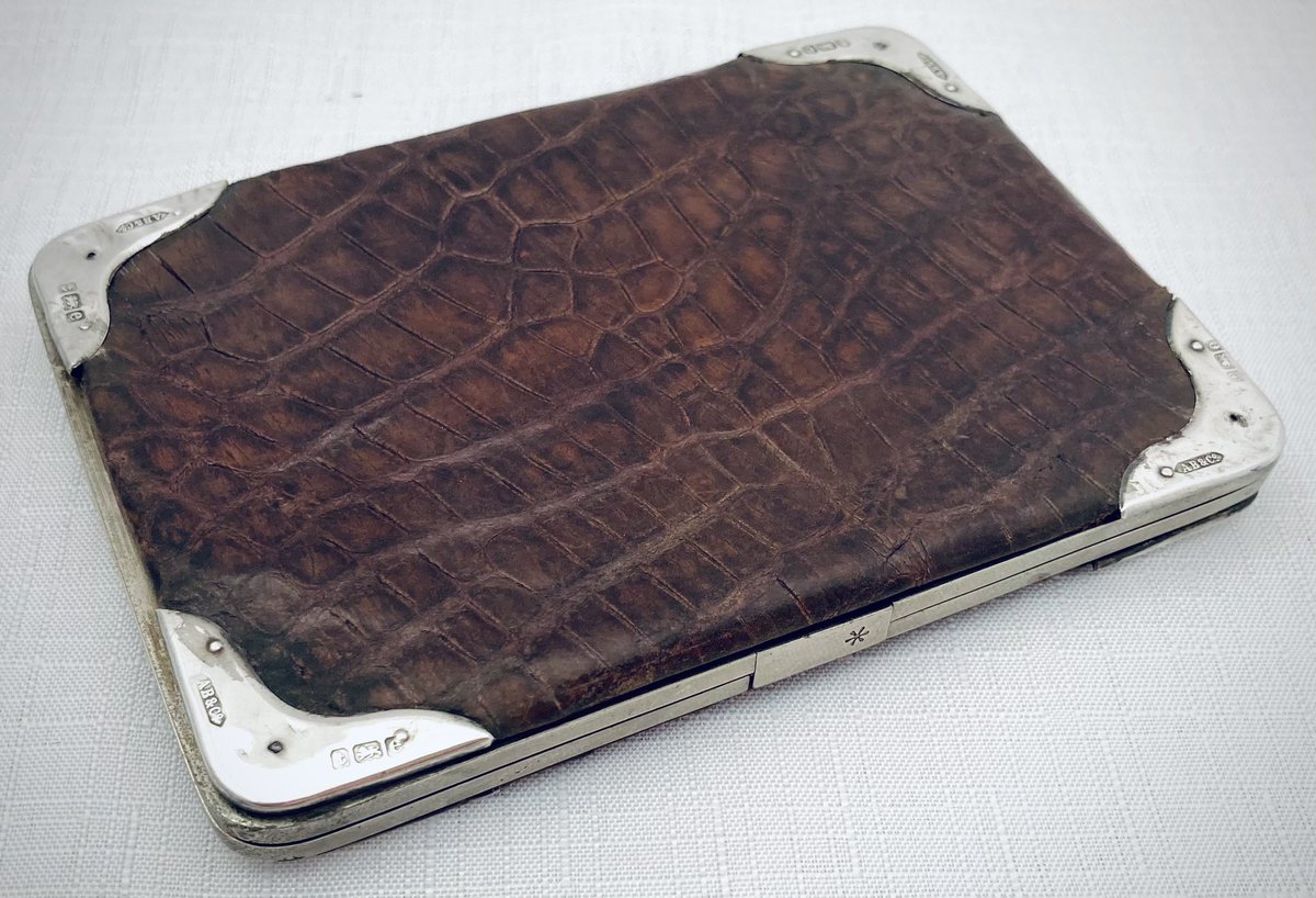 An Edwardian silver mounted and steel framed reptile skin card case. Hallmarked for Birmingham 1904. #antiques #wallets #cardcases #Edwardian