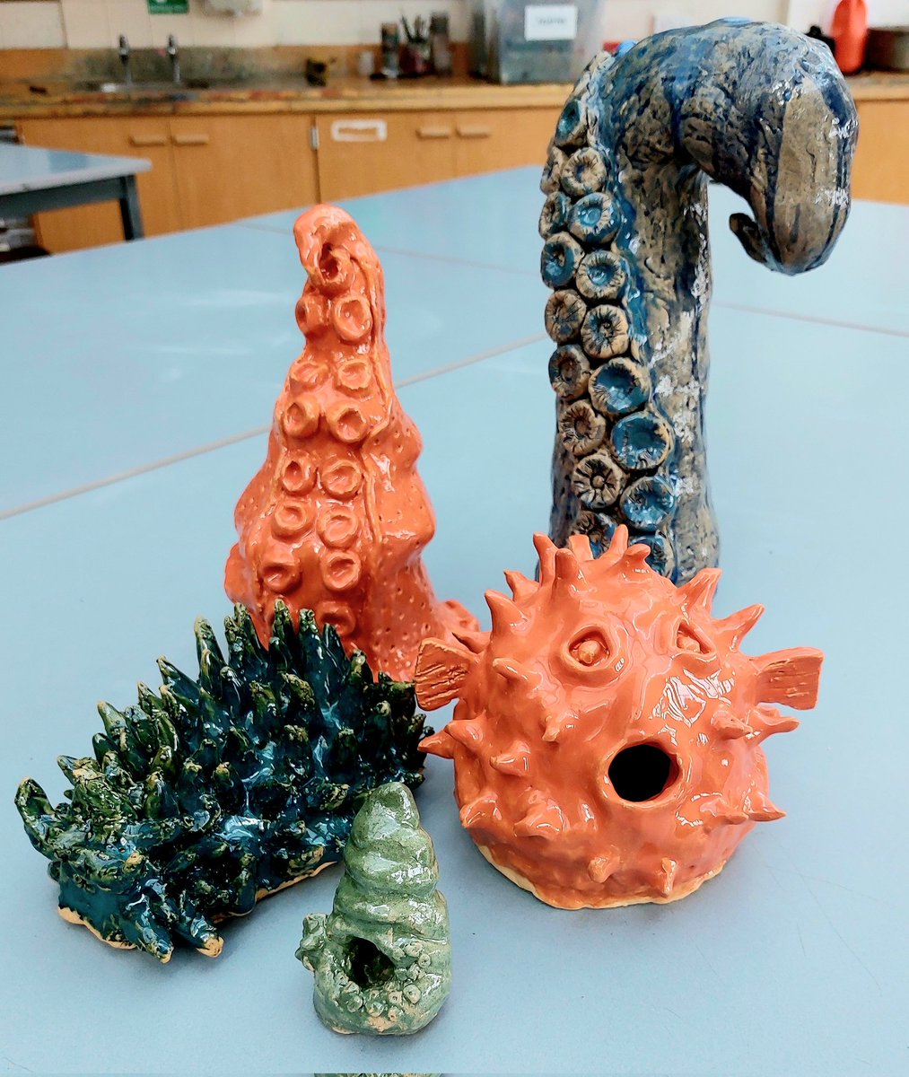 ArtsNHS's tweet photo. Octopus tentacles, sea slugs and barnacled shells are all themes that Year 8 covered in their marine life ceramics and this little group of sculptures has just come out of the kiln this week. 
#wecan #wecansculpt
#wecanglaze #wecancreate https://t.co/21zuXcJcim