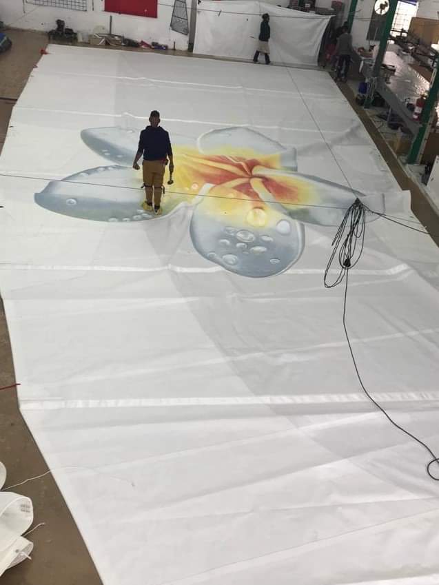 Currently on the loft floor at Ullman Sails South Africa is this Cruising Dacron, pin head main for a Mirage 760 getting the most wonderful art work. How beautiful and realistic are those water droplets?

#cruisingwithullman