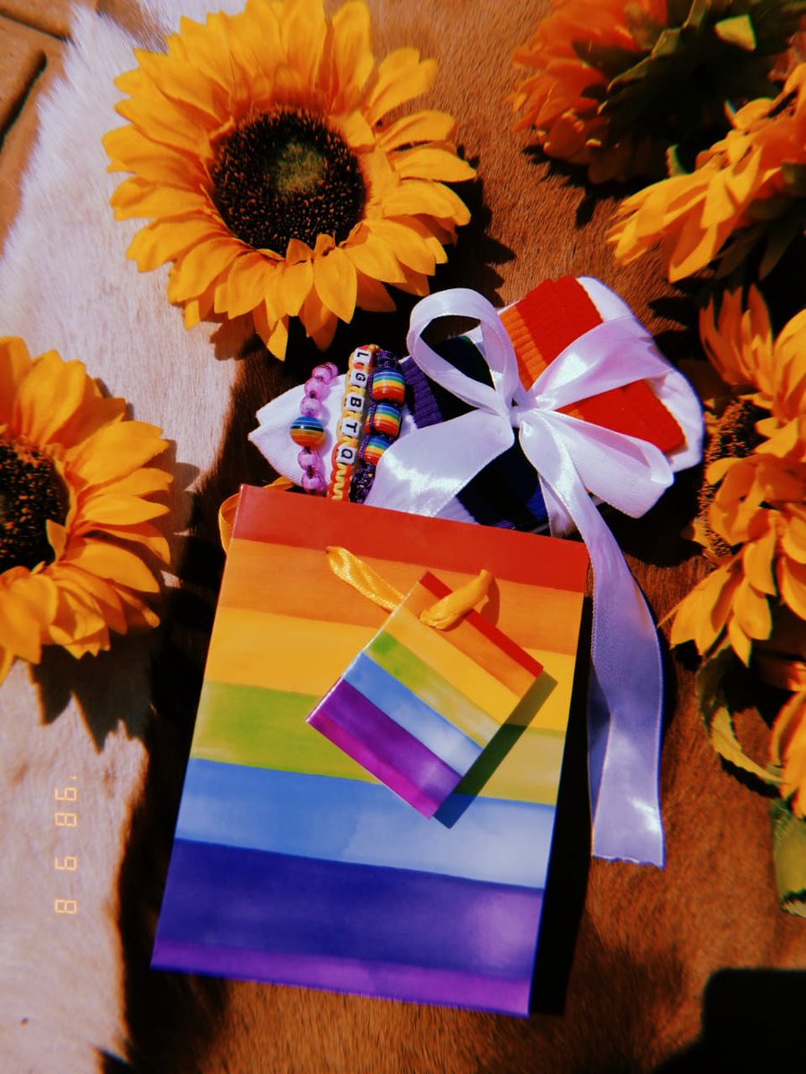 QueerCentral_ZA's tweet photo. Simple gift pack for your celebrations for only R300 including delivery. Consisting of 2x pride socks*, 3 bracelets and the cute gift bag. We can also personalise the name bracelet to a name of your choice.

Please whatsapp 0745394013 for orders 🏳️‍🌈
#lgbtqia #queercentral #khwiye https://t.co/leaxwvxCaU
