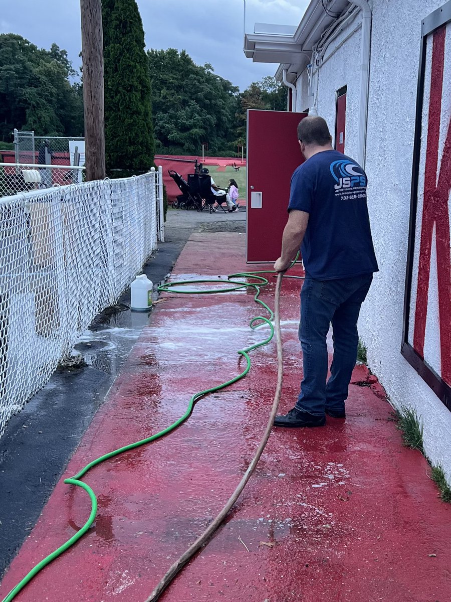 PORTPRIDE1's tweet photo. DAY 1 Alumni and future alumni giving back power washing field house getting ready paint #PORTPRIDE #THEPORT @KeyportSchools @FBKeyport @KeyportSports https://t.co/E6lNz52noU