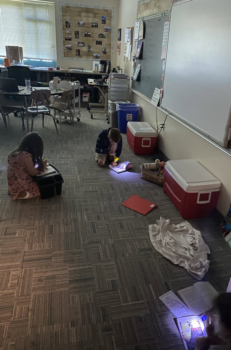 Third graders went straight into camping mode during the power outage. Flashlights to the rescue!