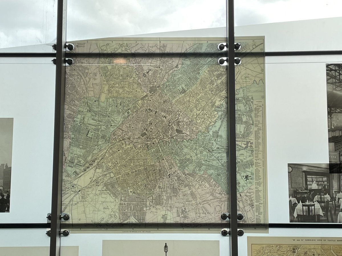 dvinchik's tweet photo. Travelling back from Manchester. All that Victorian industrial architecture in blocks reminded me of Glasgow… but flatter… and made of bricks... Having maps as decoration in the station wins bonus points. https://t.co/GxSSCdITvG