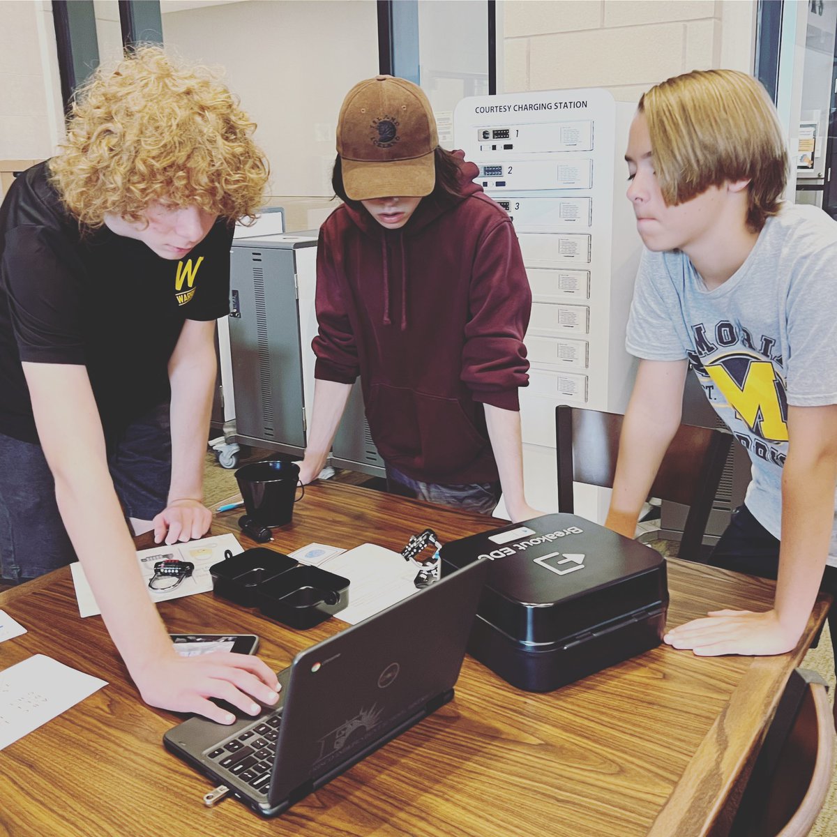 warrior4library's tweet photo. I love the looks of concentration! Prof Comm had 100% breakout this morning. That is a great start to Thursday! 
#breakoutedu #highschoollibrary #gamifylearning #fisdlibraries #fisdmadetoshine https://t.co/rxP3joDdEA