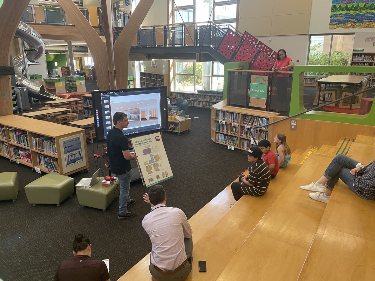 Capital Bond representatives visiting with a small group of Lowrie students to discuss plans for our new primary school in Wilsonville: