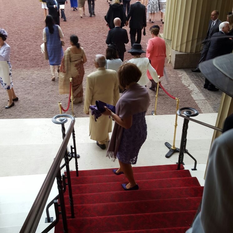 Walking down the steps of Buckingham Palace.. A day to remember.  Queenie you were a legend.