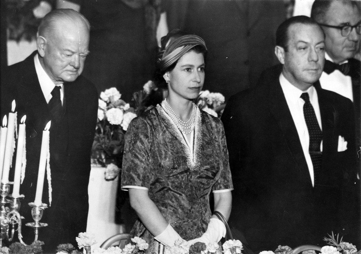 HooverPresLib's tweet photo. In remembrance of Queen Elizabeth, here is an image of her with former President Hoover and New York City mayor, Robert Wagner, during her visit to the U.S. in October 1957. https://t.co/xuW09ue4Na