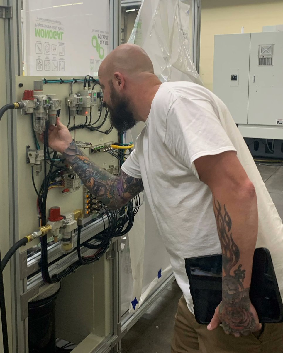 Making small adjustments to the pneumatics on this custom-built machine! #automation #roboticautomation #industrialautomation #industrial