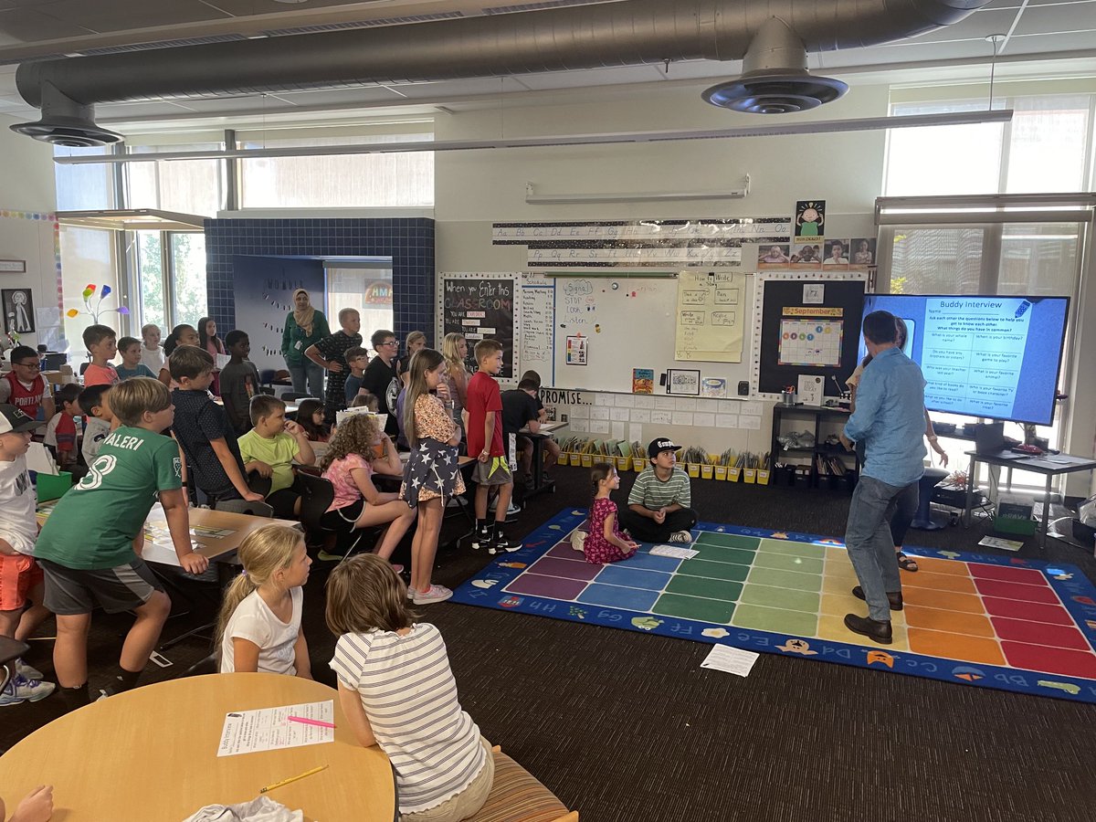 It has been a couple of years, so it is great to see buddy classes getting together and start building friendships throughout the grades, starting with creating a special handshake: