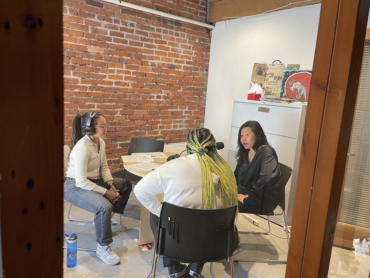 employtoempower's tweet photo. Peeking in on Charissa (our advocacy lead), @deirdrepinnockdesign, and Grace Quan from @vote4team recording a podcast. Our entrepreneurs are interviewing candidates from each party about their plans for the Downtown Eastside. https://t.co/mnfGnDzrHe