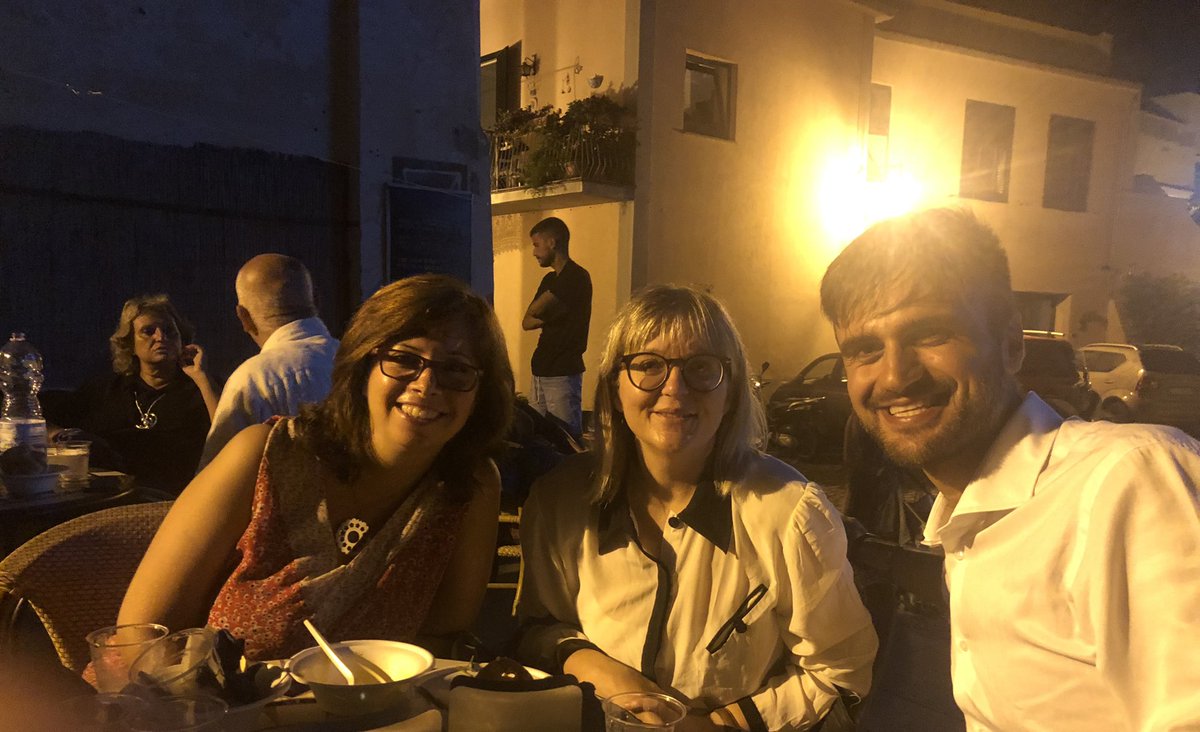 Discussing literary multilingualism and magic with colleagues after having enjoyed a poetry performance.
