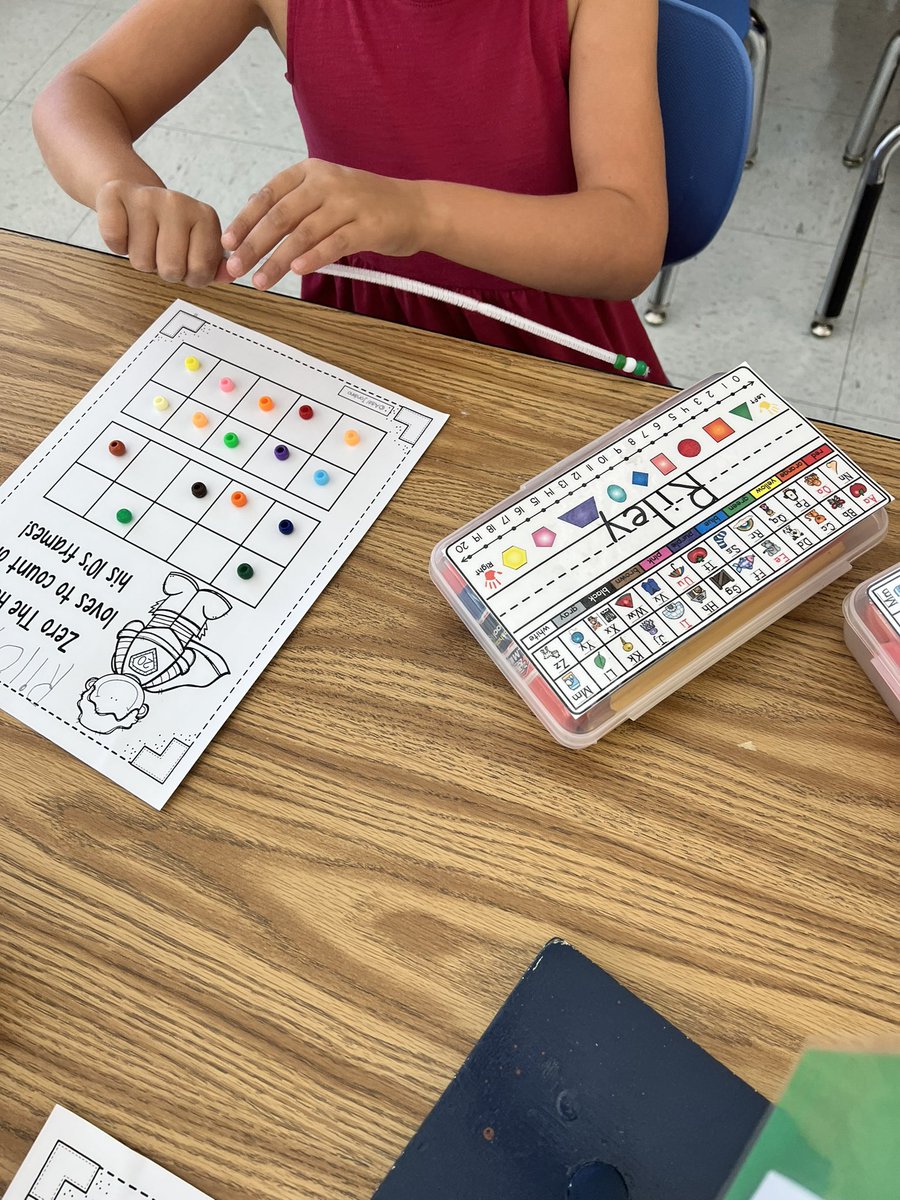 Wolfman1st's tweet photo. Happy 20th Day of School…a few days late! Zero the Hero brought us beads to count using ten frames. Then we made bracelets. Such fun! 2️⃣0️⃣ https://t.co/JCy293W7mE
