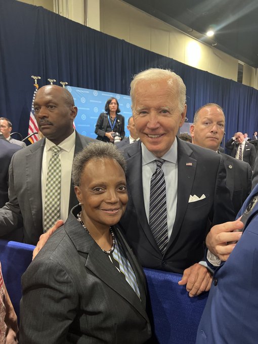 Lori & Biden in embrace;