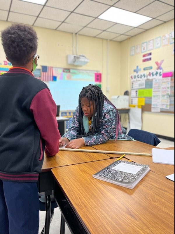 DanielsMoneek's tweet photo. Back to basics with rounding we went to ensure that our quick check tomorrow will be on point. Yard sticks work wonders for more than measurements. Thanks Mrs Watkins! @MakingMath_WORK  @SheralynShepard @LashondaStorr @BookersBunch https://t.co/0ZOhvNa6Nz