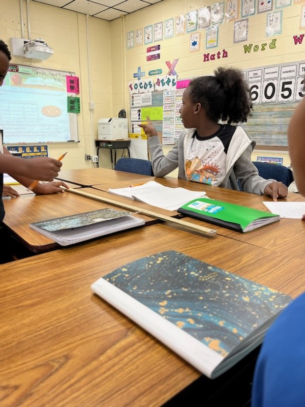DanielsMoneek's tweet photo. Back to basics with rounding we went to ensure that our quick check tomorrow will be on point. Yard sticks work wonders for more than measurements. Thanks Mrs Watkins! @MakingMath_WORK  @SheralynShepard @LashondaStorr @BookersBunch https://t.co/0ZOhvNa6Nz