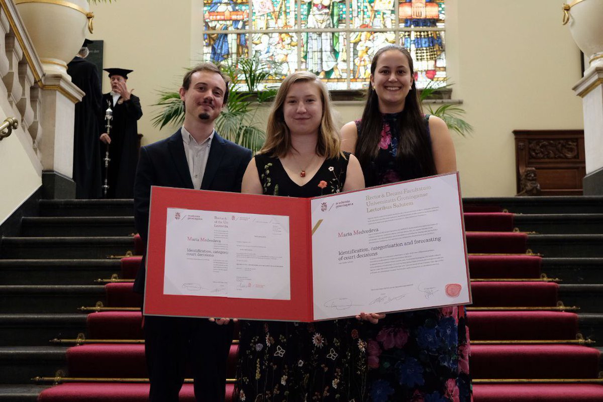 By far the most important event of yesterday: <a href="/JudgyLinguist/">Masha Medvedeva</a> successfully defending her PhD! 🥳

Not an easy feat, as she had to convince both lawyers and NLP nerds 😁 but she did an amazing job! Congrats, dr. Medvedeva!

PS: she actually made the dress she is wearing herself!