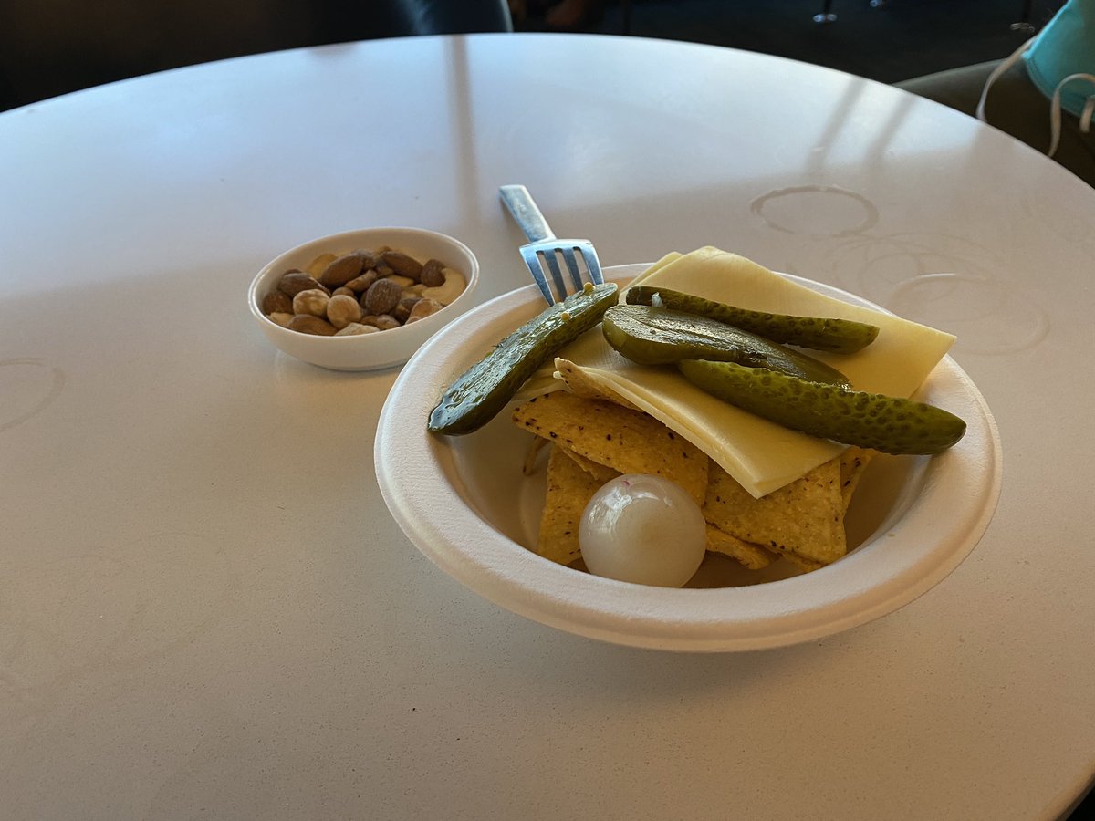 Keeping it classy in the <a href="/Qantas/">Qantas</a> business lounge in Sydney. The plastic sliced cheese in a paper bowel is top notch. And the pickled onions would make the local fish and chip shop proud.