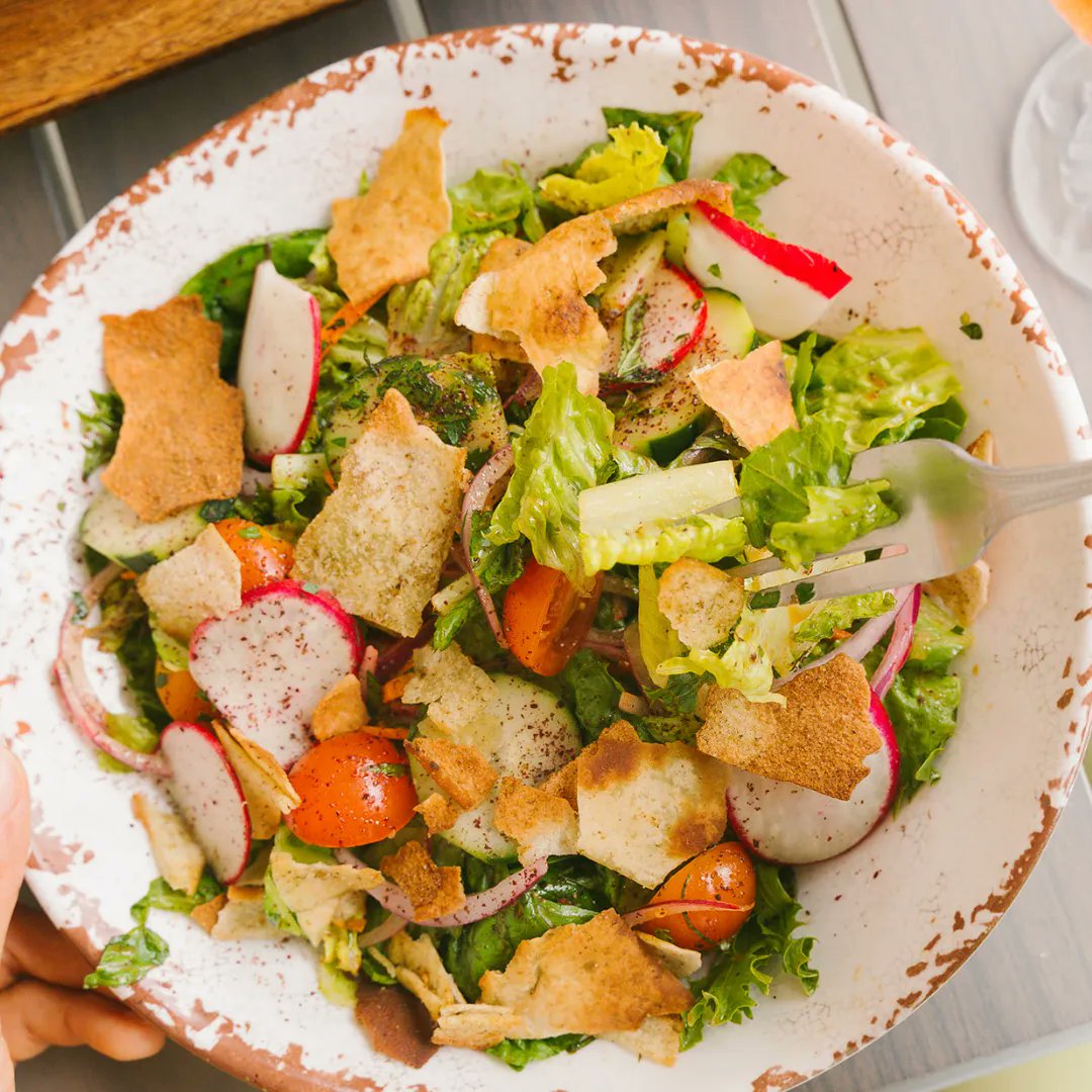 Fattoush Friday!🥗 

Fattoush is a Lebanese kitchen sink salad. This salad typically consists of assorted greens, cucumber, tomato, radish, sumac, toasted or fried bread, and a pomegranate molasses dressing.
