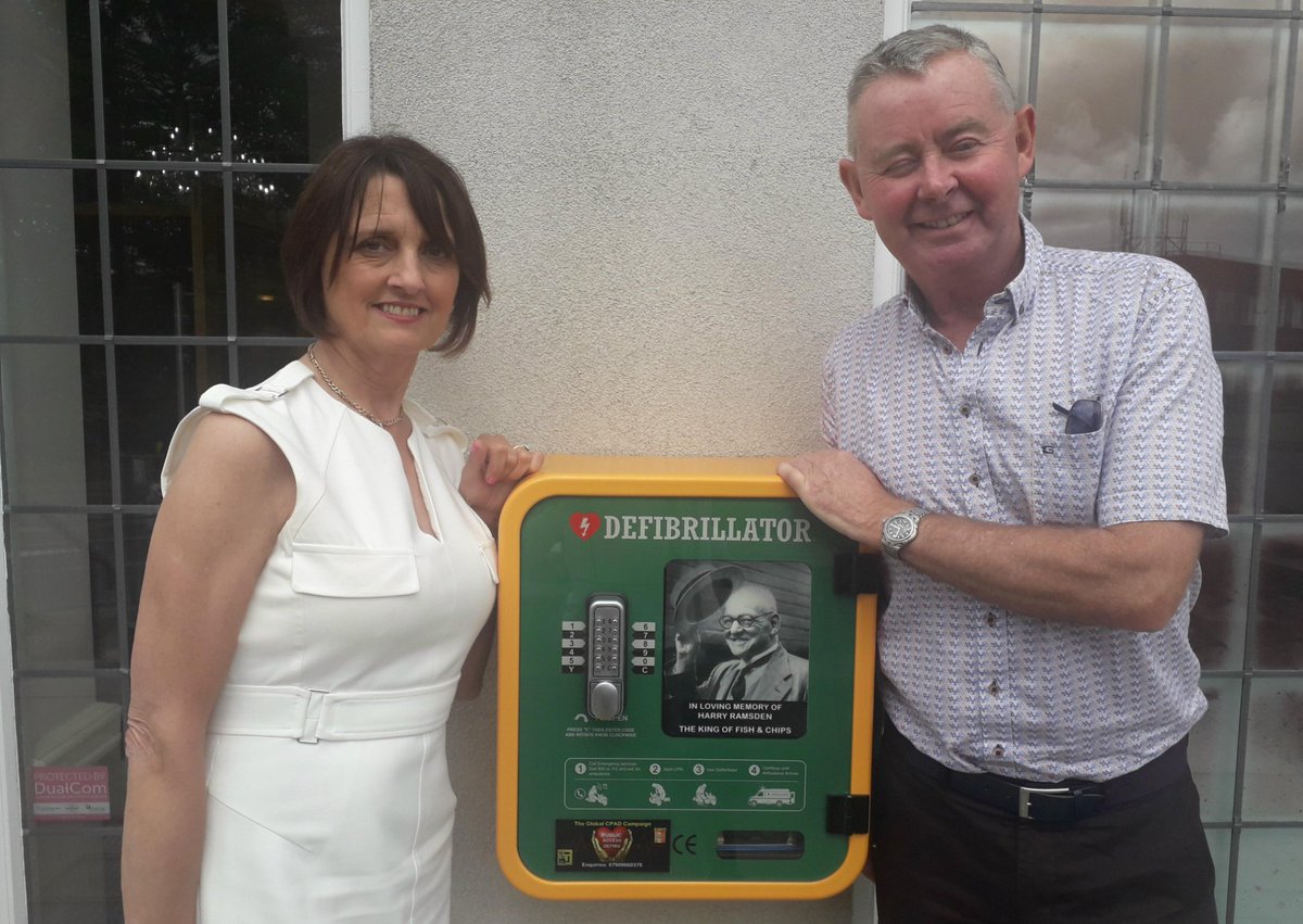 Wetherby Whaler in Guiseley recently installed a #durafib cabinet which has been dedicated to Harry Ramsden, the King of Fish &amp; Chips. This was his original Fish Restaurant , the photo included Harry`s
granddaughter Sally Baxter with her husband. #defibssavelives #harryramsden