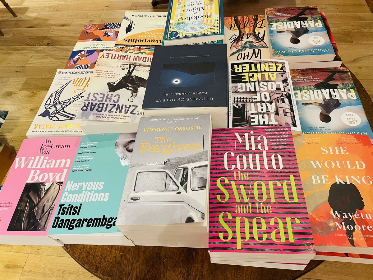 ZahirraD's tweet photo. Feels like your garden variety bookshop when you first step in, but it is very far from it. All that wood and the incredible silence. And those windows! Finally, I love that they recognise Africa is not a country. All the regions of the continent are well-represented 💜 #daunt https://t.co/FalaKKeNCT