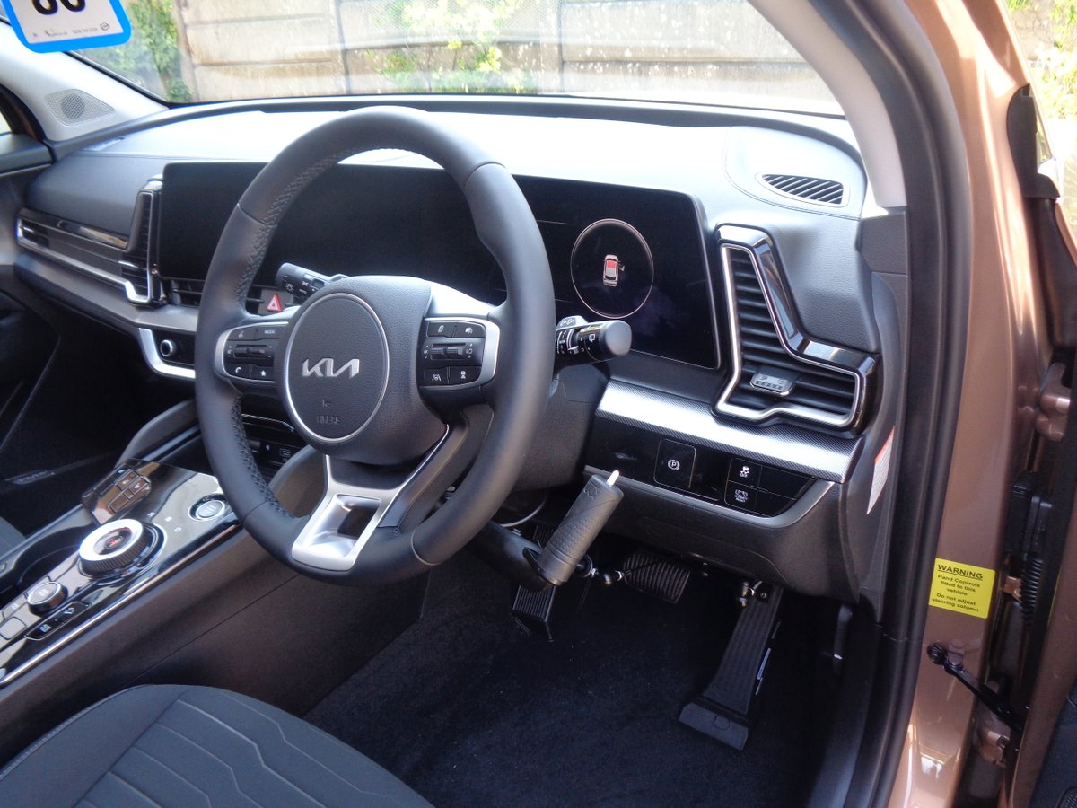New Kia Sportage hybrid fitted with push/pull brake/accelerator hand controls and integral indicator switch.

Also already designed for this model are the electric left foot accelerator and transfer plate adaptations.

#design #adaptations #driving #newcar #handcontrol