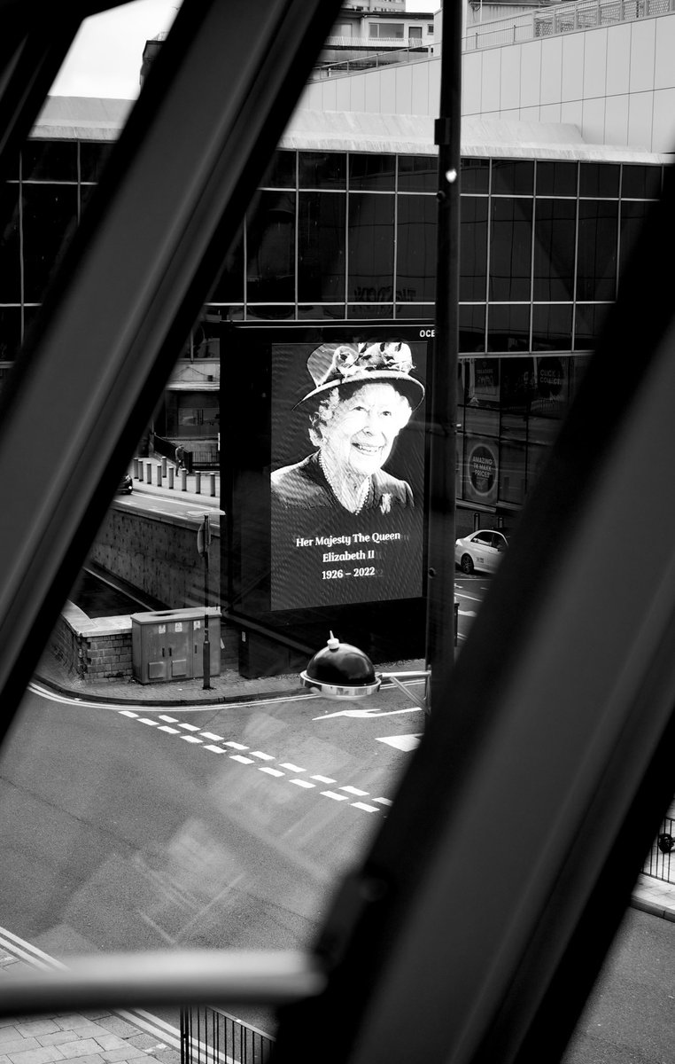 Queen all over #brum today. #streetphotography #QueenElizabeth #blackandwhite