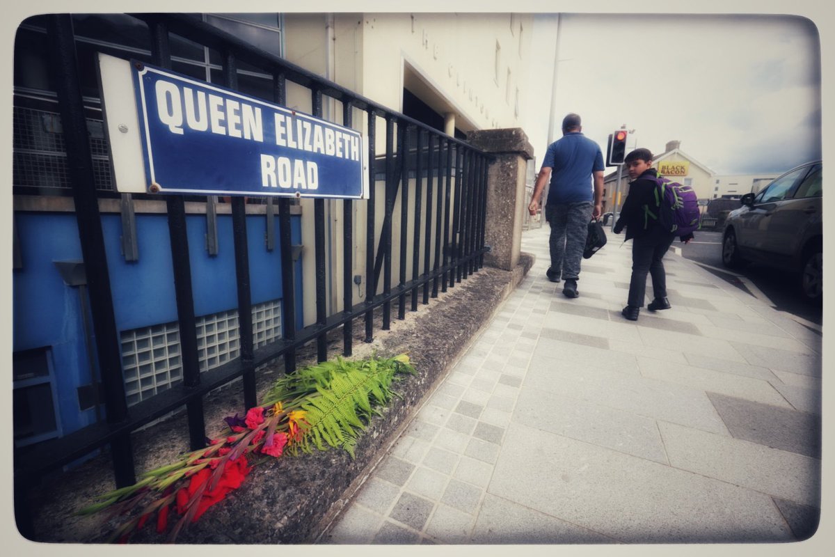 JohnMcVittyPix's tweet photo. Flowers laid at one of the iconic roads in #Enniskillen where Her Majesty Queen Elizabeth 11 visited in 2012. #queenelizabeth #diamondJubilee https://t.co/CkyGOjI32S