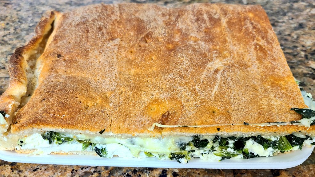 ConshyBakery's tweet photo. #New to the stuffed pizza varieties: Ricotta, Spinach, Mozzarella & Provolone!! Great with a side of tomato pie sauce! 😋 #stuffedpizza #conshy #Conshohocken https://t.co/6V250xej5w