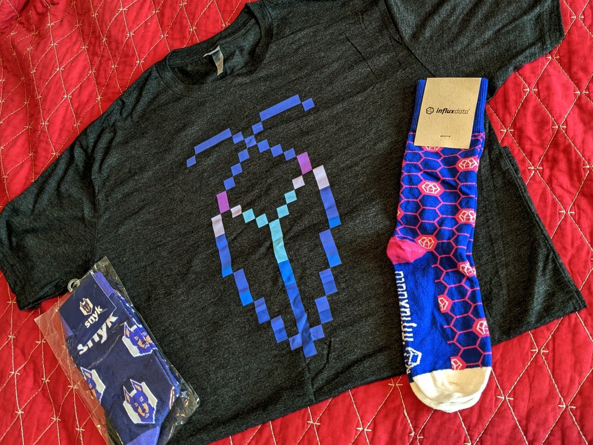 barton808's tweet image. Conference swag from #Devweekcloud that I'll be sporting soon: shirt by @CockroachDB, socks from @InfluxDB's fall collection, and Versace's @snyksec socks