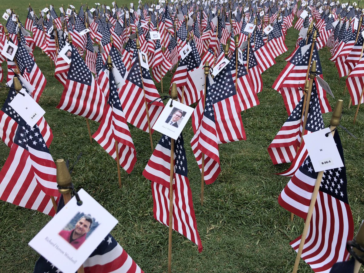 WCCBCharlotte's tweet photo. 2,977 American flags are in the ground at Romare Bearden Park, in the shape of the twin towers. Each will have the name and picture of a person lost that day. The #flagsofremembrance will be on display till Monday. #September11 https://t.co/1lM3SJXVB3