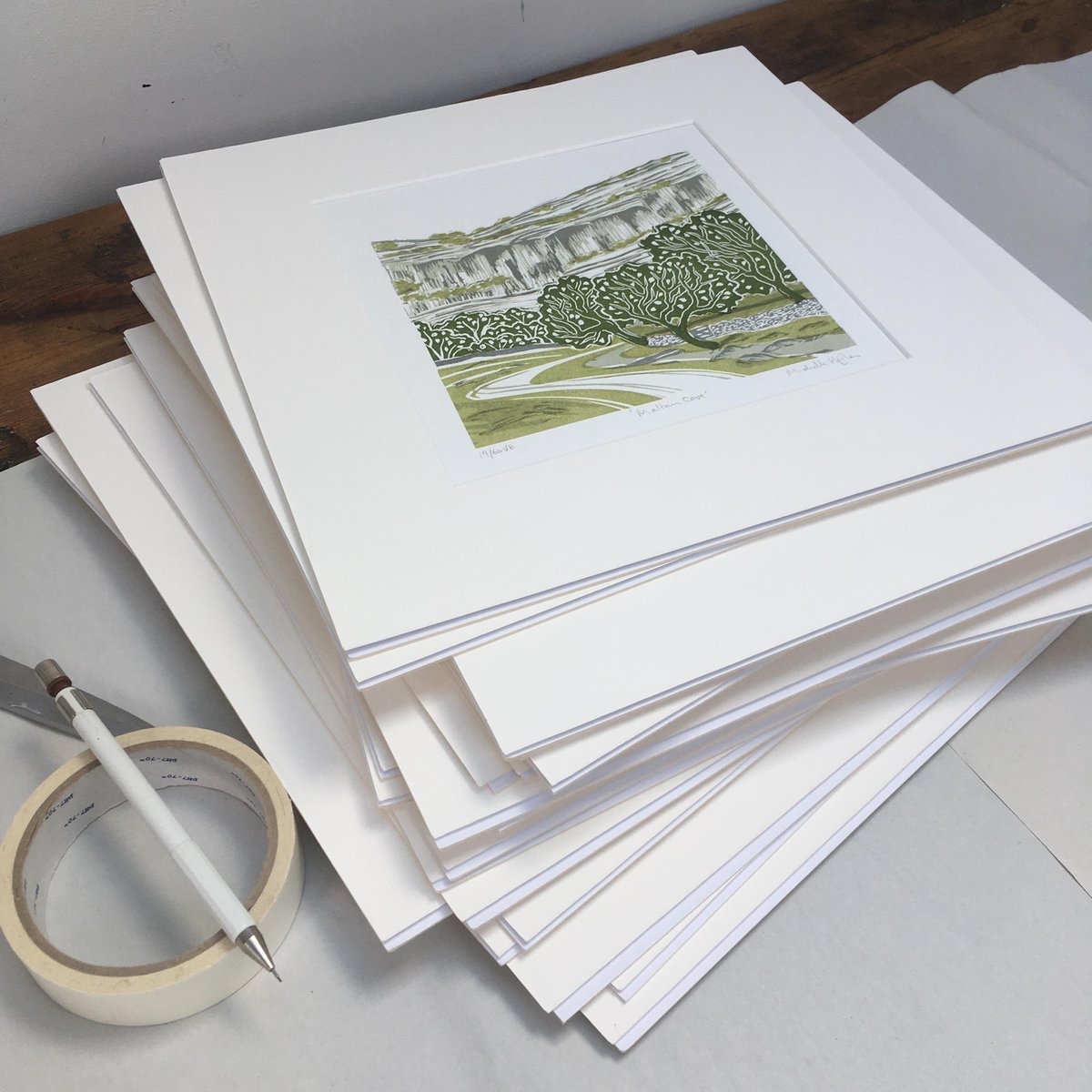 Design_York's tweet photo. I don't do last minute! Mounting up prints that are dry for the @YorkPrintmakers print fair.
#linocut #linoprint #printmaking #York #contemporaryart #originalprint #artexhibition #YorkshireDales #YorkshireDalesnationalpark #malhamcove #Yorkshirecountryside #Multiblockprint https://t.co/bz20JwMxNF