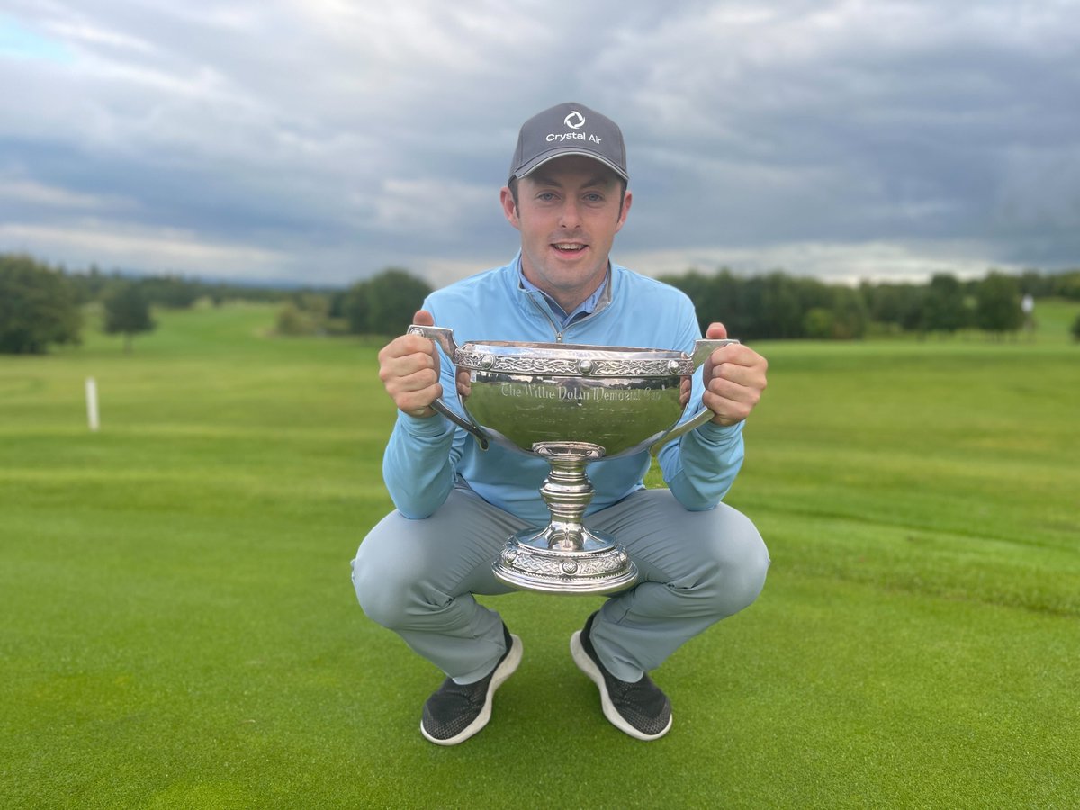 PGA_Ireland's tweet photo. Introducing your 2022 Irish Club Pros Champion Liam Grehan @TheKClubGolf supported by @zoom @phonepulse. Liam shows off The Willie Dolan Memorial Cup after shooting a course record of 6 under par 67 @clubmillicent 👏👏
@thepga @PGA_Ireland https://t.co/eI20q4oVGd