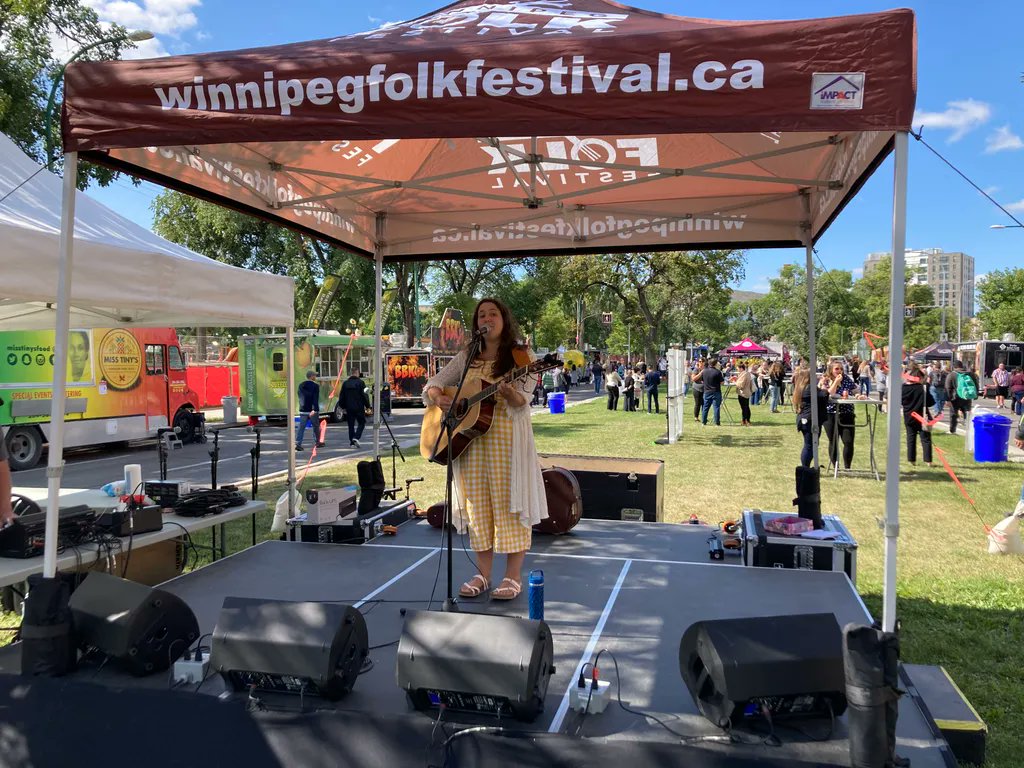 .<a href="/katherinefmusic/">𝐊𝐚𝐭𝐡𝐞𝐫𝐢𝐧𝐞 𝐅𝐢𝐬𝐜𝐡𝐞𝐫</a> on the Winnipeg Folk Fest stage at @manyfestwpg! Music starts again at 4:30 PM check out the website for the lineup. 🎶 bit.ly/3L1nVLF