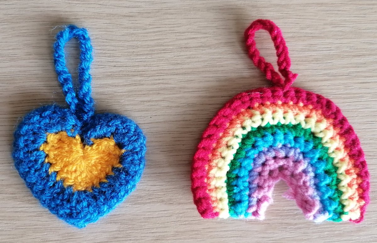 MissWelsh5's tweet photo. In Feb I found a string of these Ukrainian crocheted hearts around a post box with a note encouraging people to take one in solidarity &amp; it's been displayed in my class since. Today one of my wonderful PSAs came in with a rainbow she'd crocheted for me to add to my collection! 🥰 https://t.co/edfHwnCZf3