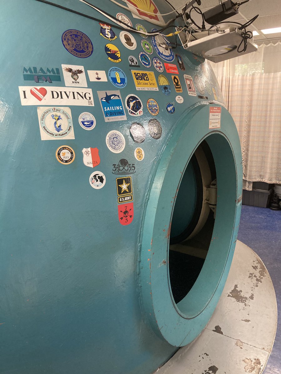 UnderwaterLance's tweet photo. @DominicTanzillo of the space medicine podcast Spherical Cows received a rare honor today when he got to apply a sticker to one of the hyperbaric chambers we use for research. Only project collaborators are invited! #SpaceMedicine https://t.co/URvBgPvYQr