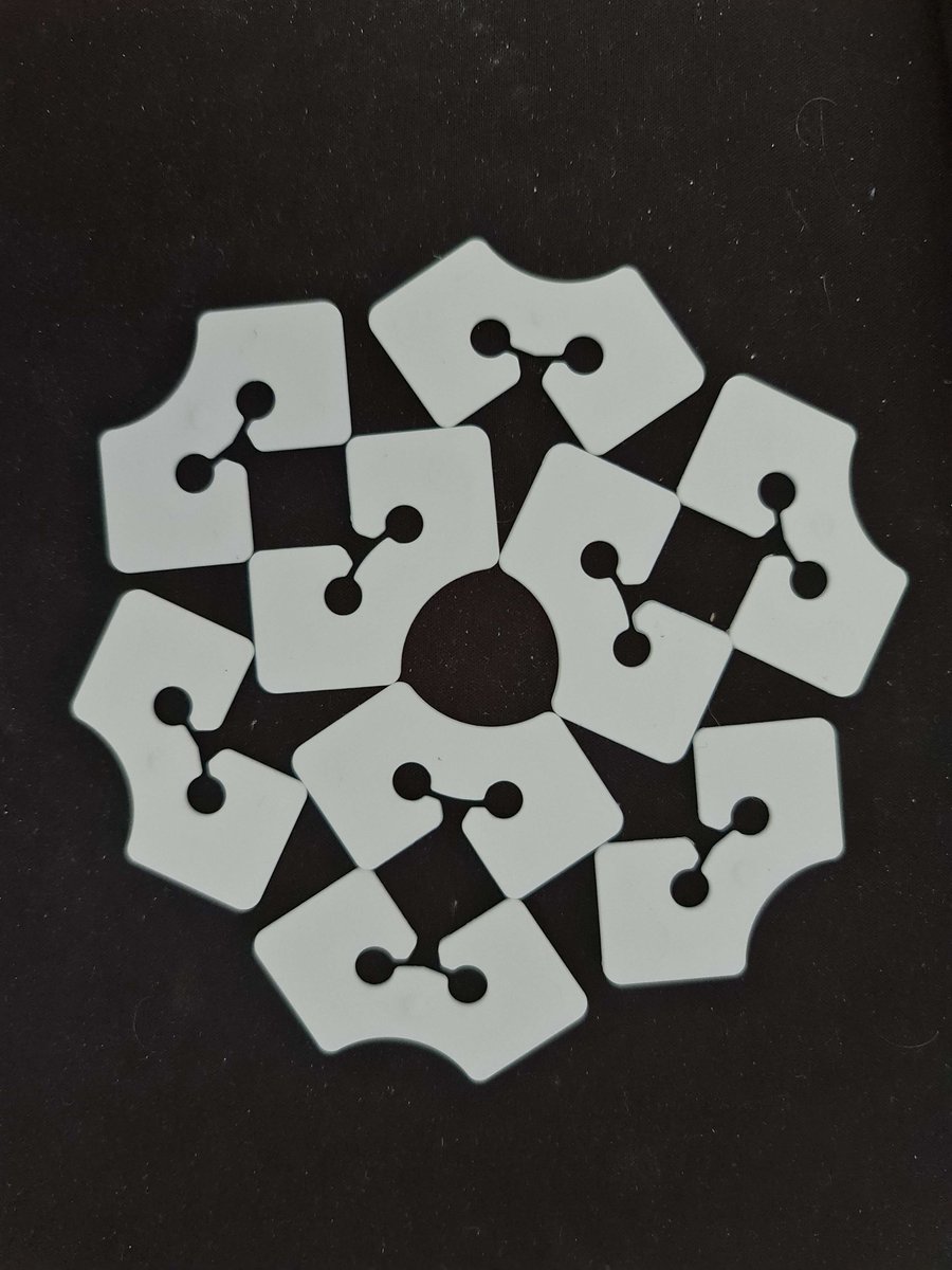 JeremyInSTEM's tweet photo. Over the last months, I've ended up accumulating a number of those little clasps that come with masks. Turns out they make satisfying tessellations and other shapes. 👀 https://t.co/nnvkYdQkE5