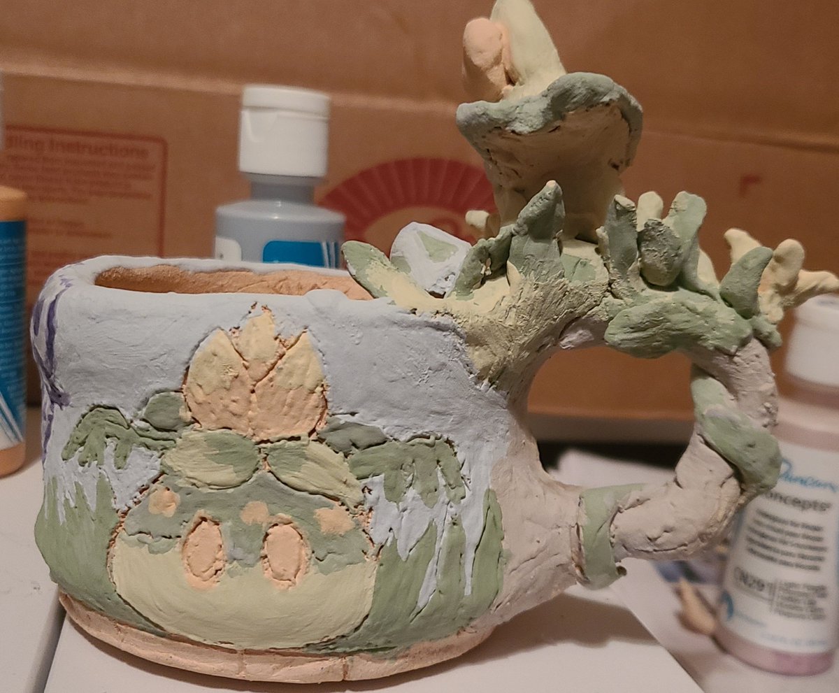 Mousealchemist's tweet photo. Ceramic homework covered in dendro fungi, slimes, and electro slimes. I feel this would Tighnari kind of cup. #Genshinlmpact #genshintwt #tighnari #dendro #fungi #dendroslime #electrosime #GenshinImpactart https://t.co/sKQSRlck2m