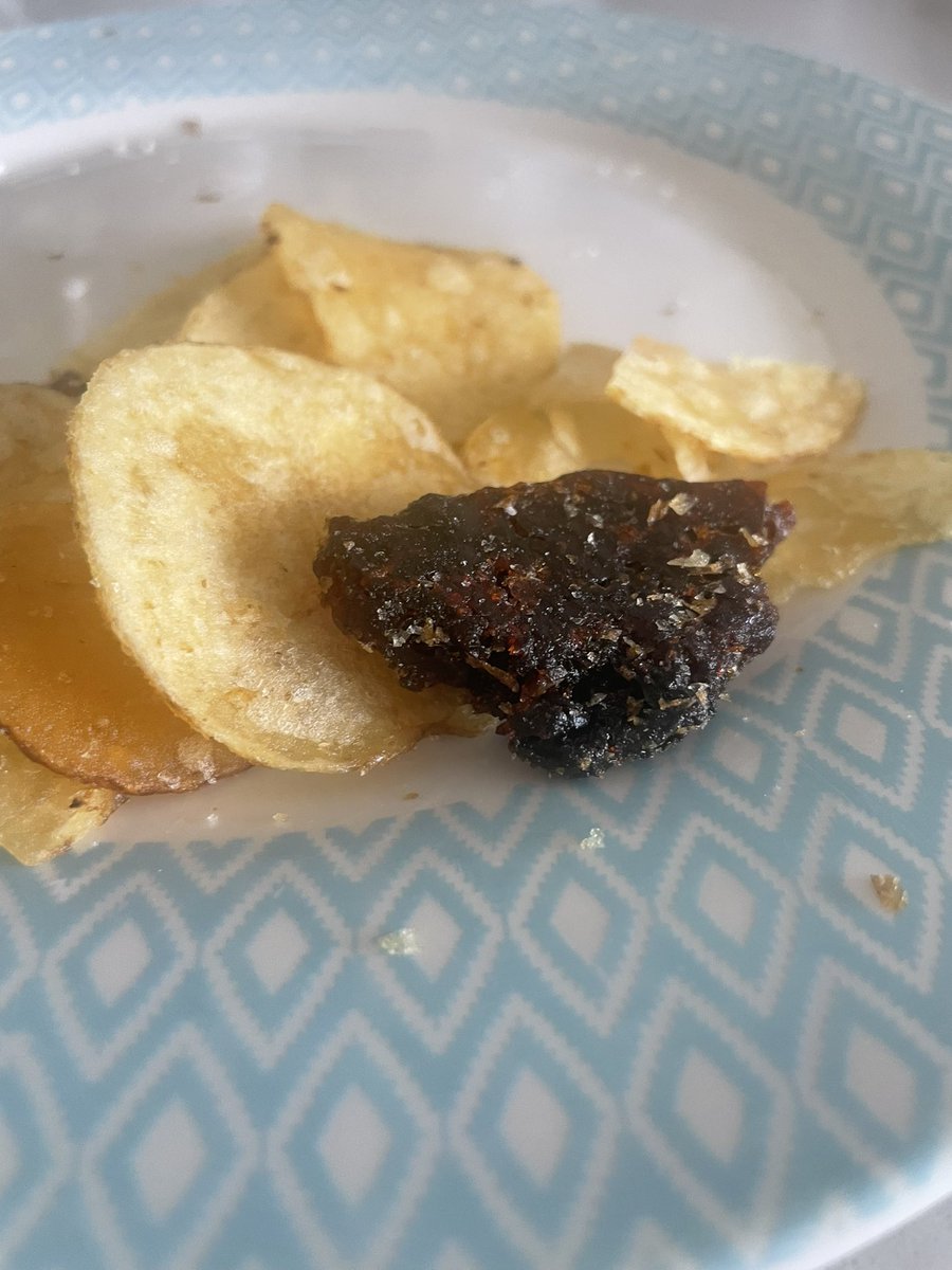 dmossstoke's tweet photo. @KETTLEChipsUK can you shed some light on what this large black “wax smelling” lump is that is in a packet of your crisps ? Is there a health risk here as my 4 year old was eating them ? https://t.co/qpae2cXeyE