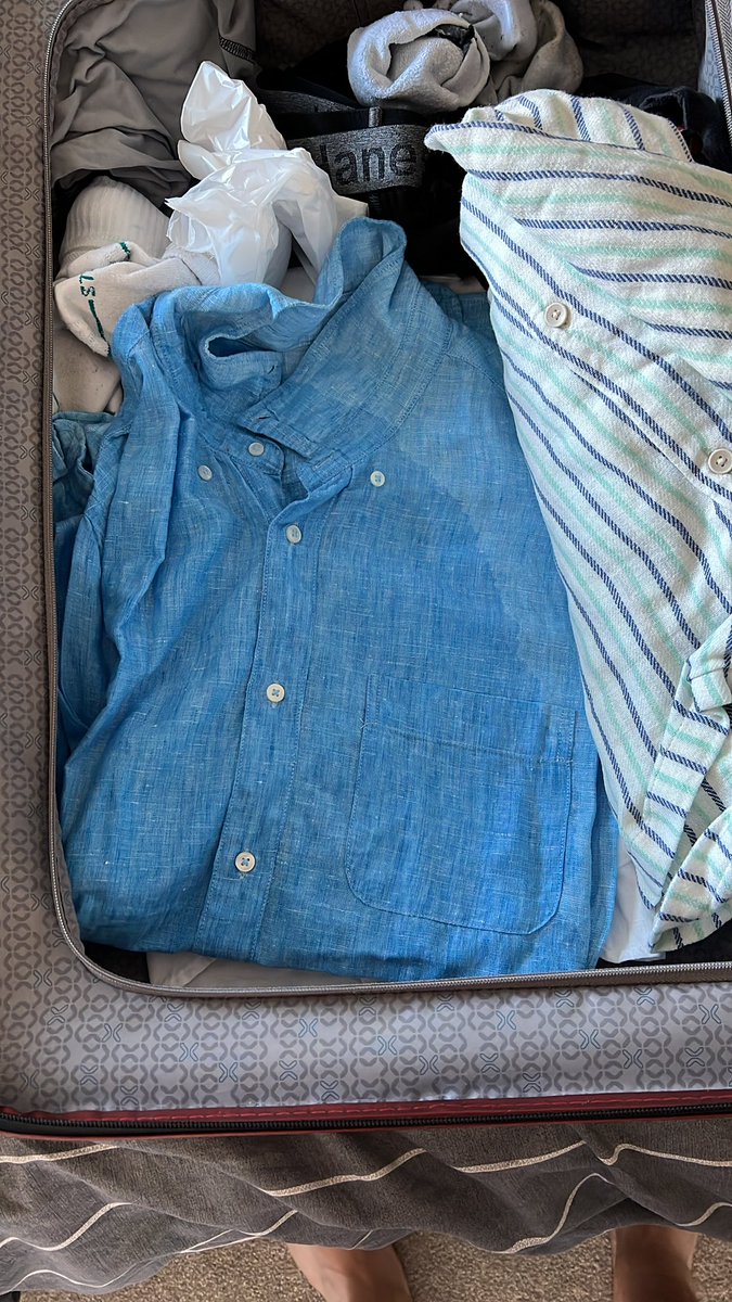 NosfusionX's tweet photo. @British_Airways I take it you must have had my bag stored in a bath at Heathrow as a little splash of rain is not going to do this to all my clothes in my bag. Bags came out wet in Belfast where it was not raining. https://t.co/Y7TAncfSxr