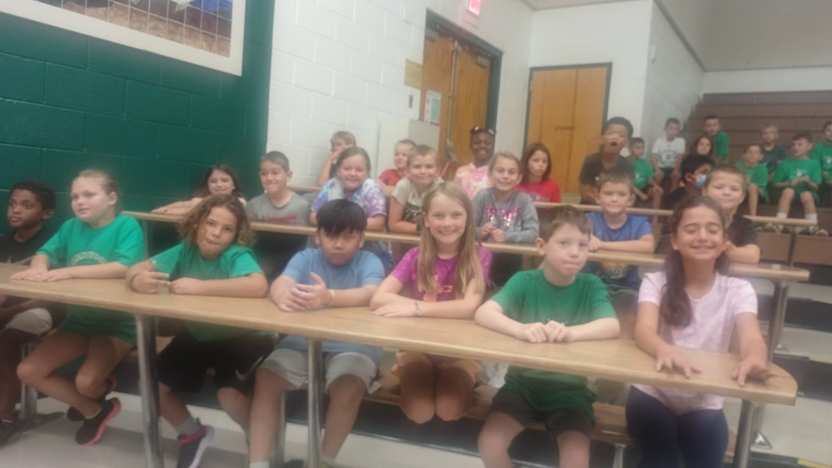 MrsGraceGreen's tweet photo. We had our first pride assembly on Friday!  Congratulations to our student (Spiderman) who answered the first question of the year correctly! ❤️🦁🐸 #Glenwoodrocks https://t.co/NfJ0mejFJ4