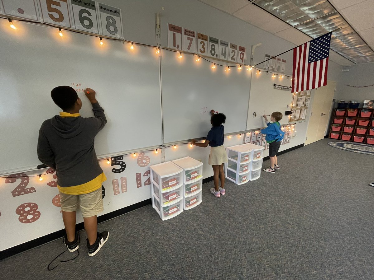 MrsMathe22's tweet photo. Some friendly Friday competition in 4th grade! They have been working on place value to the millions, knowing the value of each digit, and putting it in expanded form. We did a review game working our way from 3 digit numbers to 7 digit. They crushed it! @WilkinsonSCS https://t.co/KsCTh1aXqE