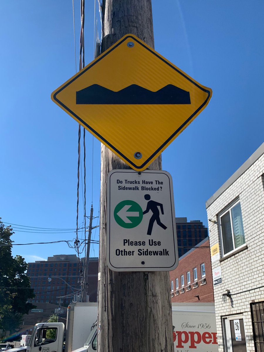 SaharActually's tweet photo. As seen in front of Topper Linen Supply on Junction road. Is this a city sanctioned sign and part of #VisionZero? Is it okay for trucks to routinely block and limit accessibility for differently abled citizens? @JohnTory @notjustbikes @311Toronto @StephenPunwasi @Penalosa_G https://t.co/zryCYpeJym