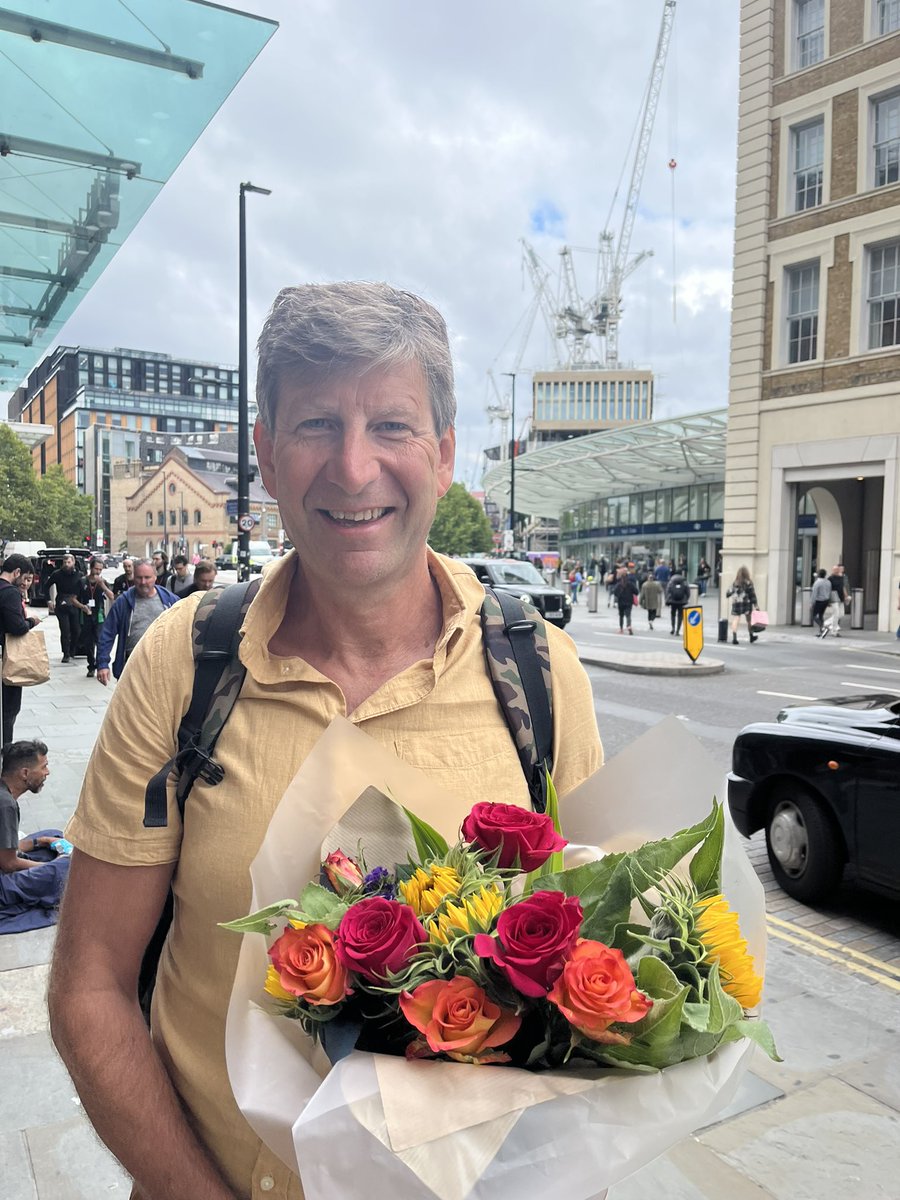 PeterSimmo's tweet photo. A traveller’s tale.  Bouquet of flowers left on train at @StPancrasInt. I was last off with a bike intending to get to the barrier waving them aloft and generally hollering.  Luckily flowers and their owner reunited. :) #picko 💐 https://t.co/c3n7wZ0SZ0