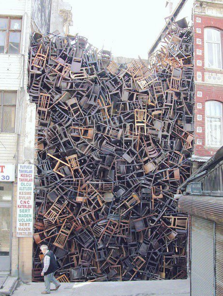 Colombian artist Doris Salcedo, installation, Istanbul Biennial, 2003, over 1600 chairs, urban art  project #WomensArt