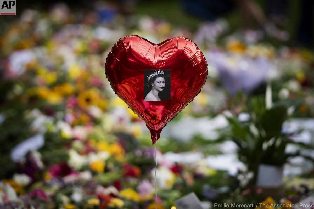 EmilioMorenatti's tweet photo. A balloon with a picture of Queen Elizabeth II is photographed at the Green Park memorial, near Buckingham Palace, in London, Saturday, Sept. 10, 2022.  Queen Elizabeth II died Thursday Sept. 8, 2022, after 70 years on the throne. She was 96. https://t.co/UfOc8XDs1O
