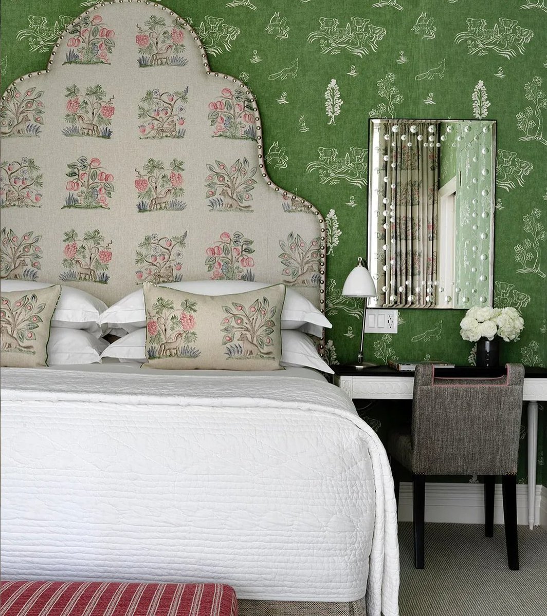 We love how @firmdale_hotels are celebrating all things glorious and green in The Whitby Hotel. 💚
 
On the wall is our Friendly Folk in Basil Green and the headboard and cushions are covered in Hedgerow Cerise. 
.
.
.
.
.
.
.
#AMinteriors #designdiscovery #andrewmartin #interi