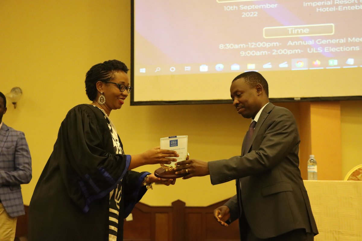 ug_lawsociety's tweet photo. Happening now: Outgoing ULS Treasurer Adv. Shane Gloria Mugenga receives an award of appreciation for her great service and leadership to the ULS membership.
#ULSAGM22 https://t.co/Z37rRNM547