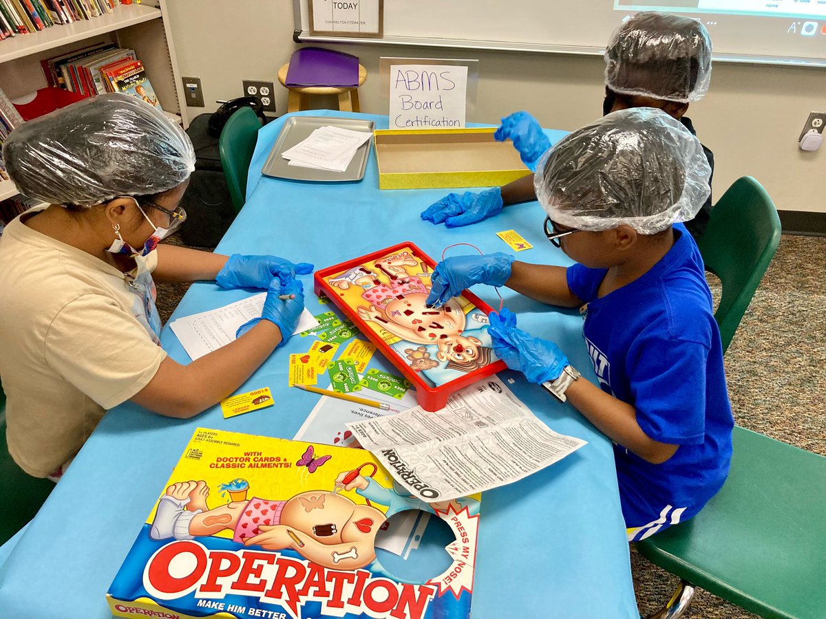 HGesch's tweet photo. Place value operating happening in Ms. Silva’s room at SLE!! #SLESUNS#Savananh LakesElemetary#MathRocks https://t.co/WNZO5jiPY7